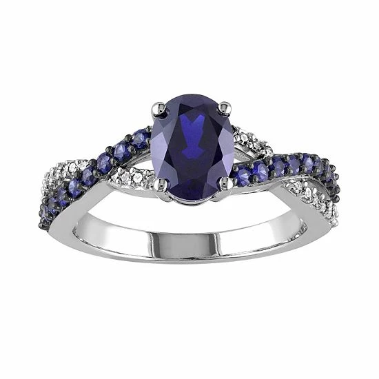 Stella Grace Lab-Created Blue Sapphire And 1/10 Carat T.W. Diamond 10k White Gold Crisscross Ring 1 Stella Grace Lab-Created Blue Sapphire And 1/10 Carat T.W. Diamond 10k White Gold Crisscross Ring