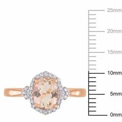 Stella Grace 10k Rose Gold Morganite & 1/8 Carat T.W. Diamond Halo Ring 11 Stella Grace 10k Rose Gold Morganite & 1/8 Carat T.W. Diamond Halo Ring -Stella Grace Sales unnamed file 4167