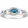 Stella Grace 10k White Gold London Blue Topaz & 1/8 Carat T.W Diamond Oval Link Ring