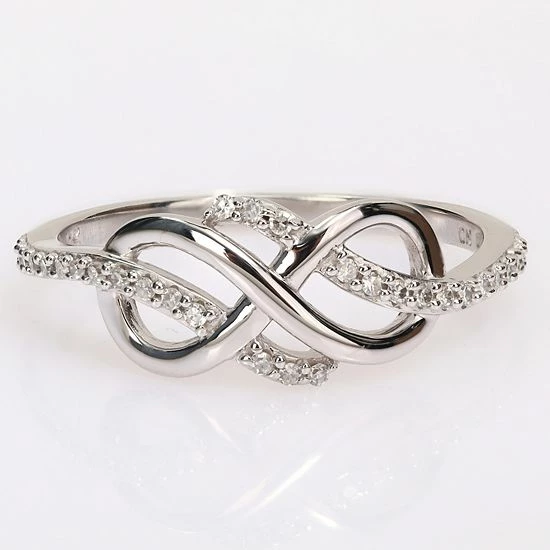 Stella Grace 1/8 Carat T.W. 10k White Gold Infinity Ring 3 Stella Grace 1/8 Carat T.W. 10k White Gold Infinity Ring - Image 3