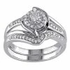 Stella Grace Sterling Silver 1/4 Carat T.W. Diamond Halo Twist Engagement Ring Set