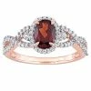 Stella Grace 10k Rose Gold Garnet, White Sapphire & 1/3 Carat T.W. Diamond Halo Twist Ring