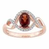 Stella Grace 10k Rose Gold Garnet & 1/6 Carat T.W. Diamond Halo Engagement Ring